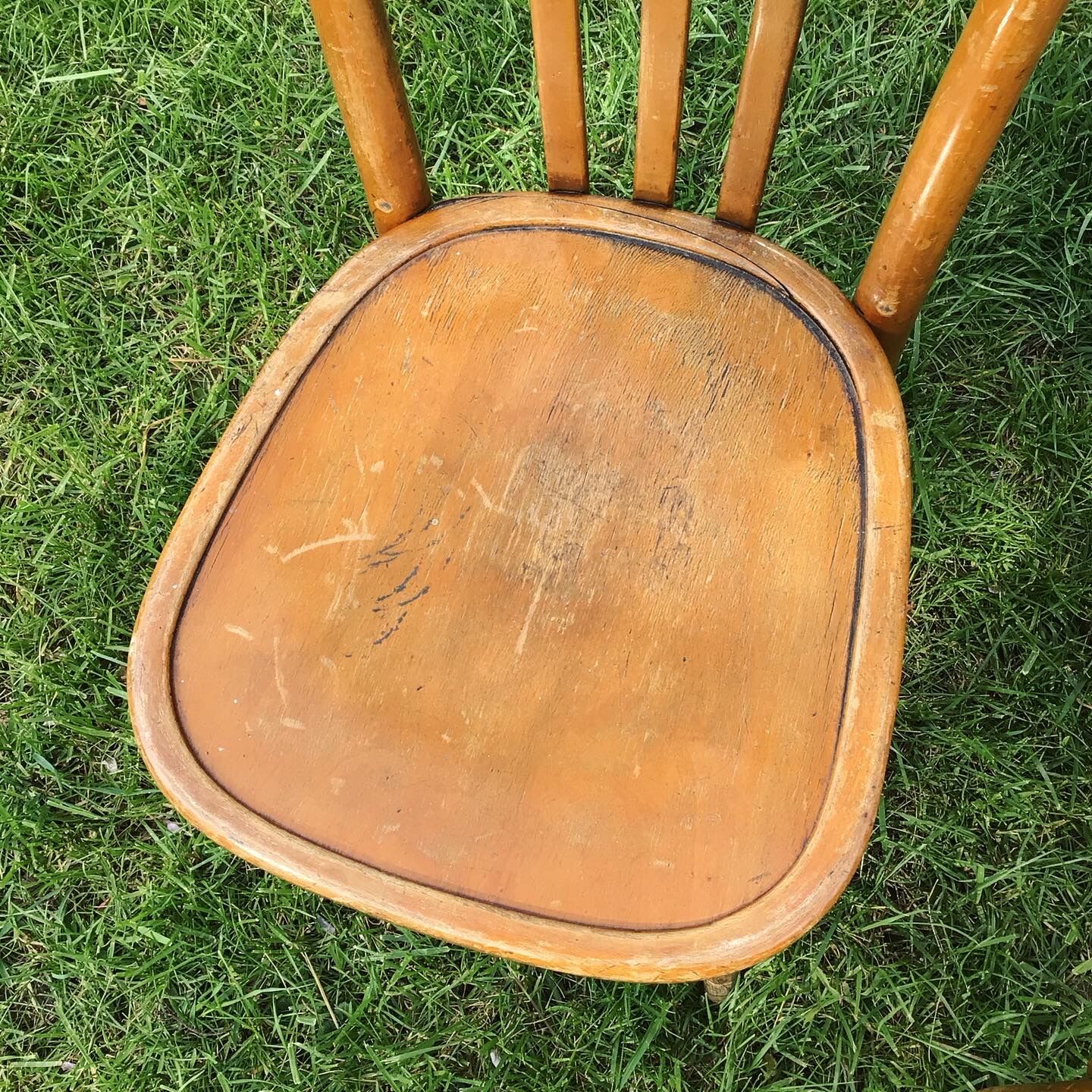 Lot of two wooden bistro chairs