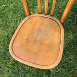 Lot of two wooden bistro chairs
