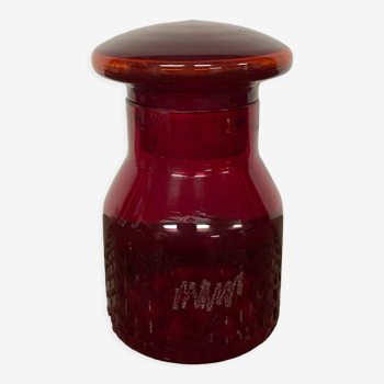 Red glass bottle
