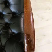 Black leather rocking Chesterfield armchair