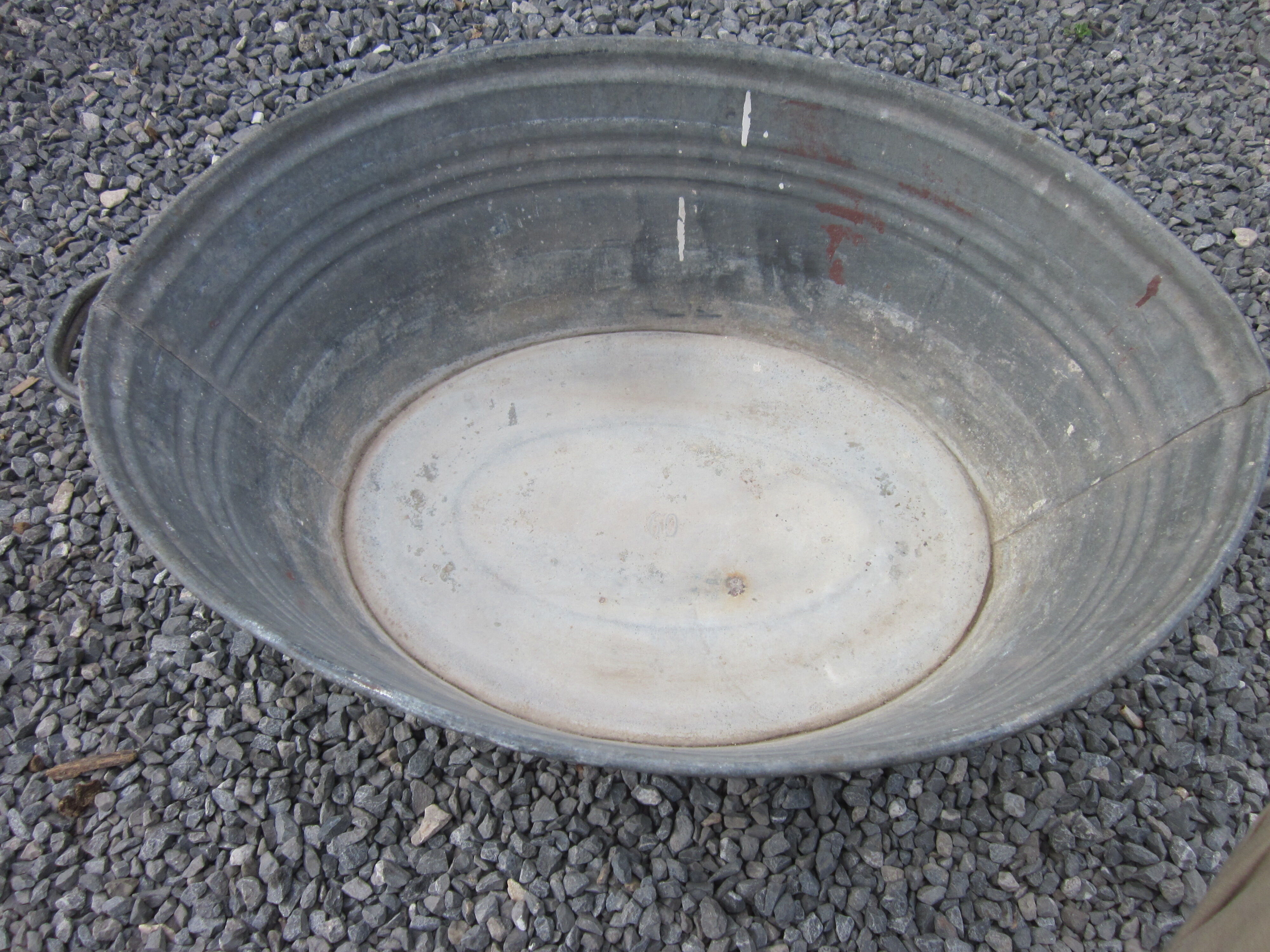 Zinc oval basin