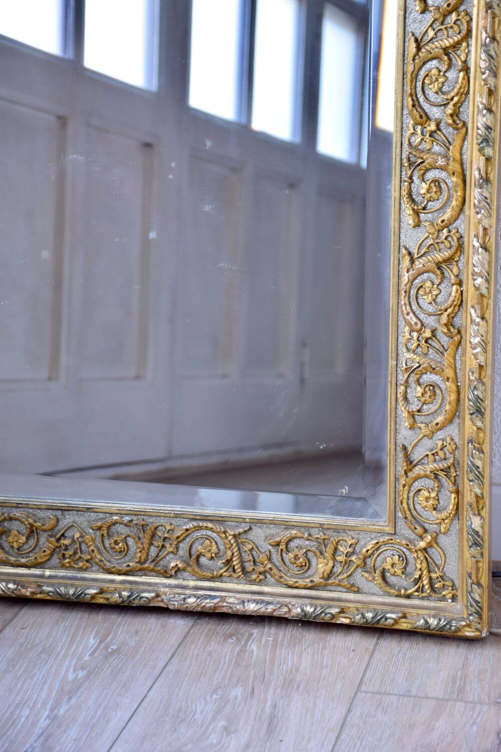 Large antique gilded mirror in the Baroque style