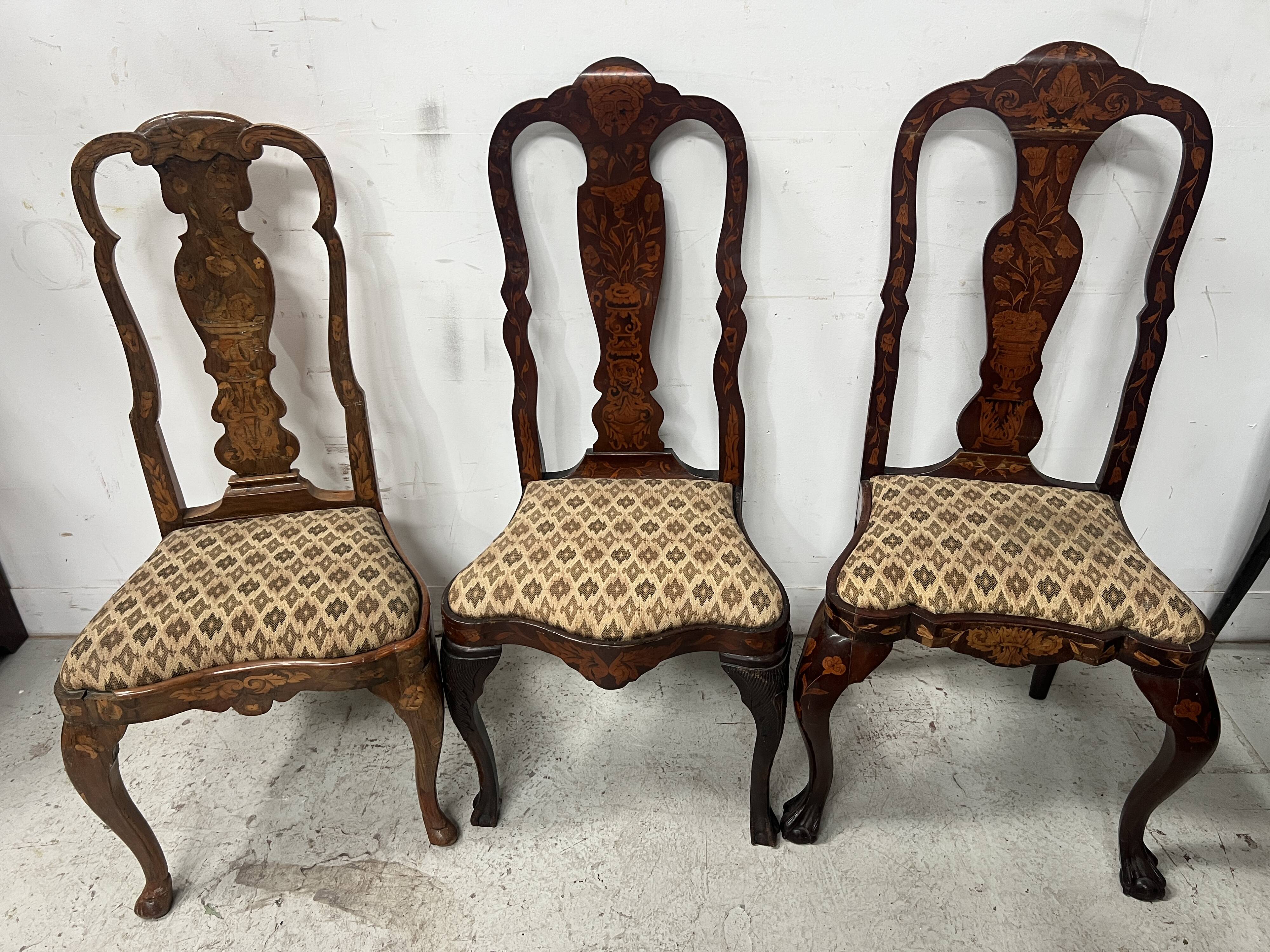 Set of eight Dutch marquetry chairs from the 19th century.