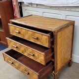 Chest of drawers made of wood, rattan and bamboo.