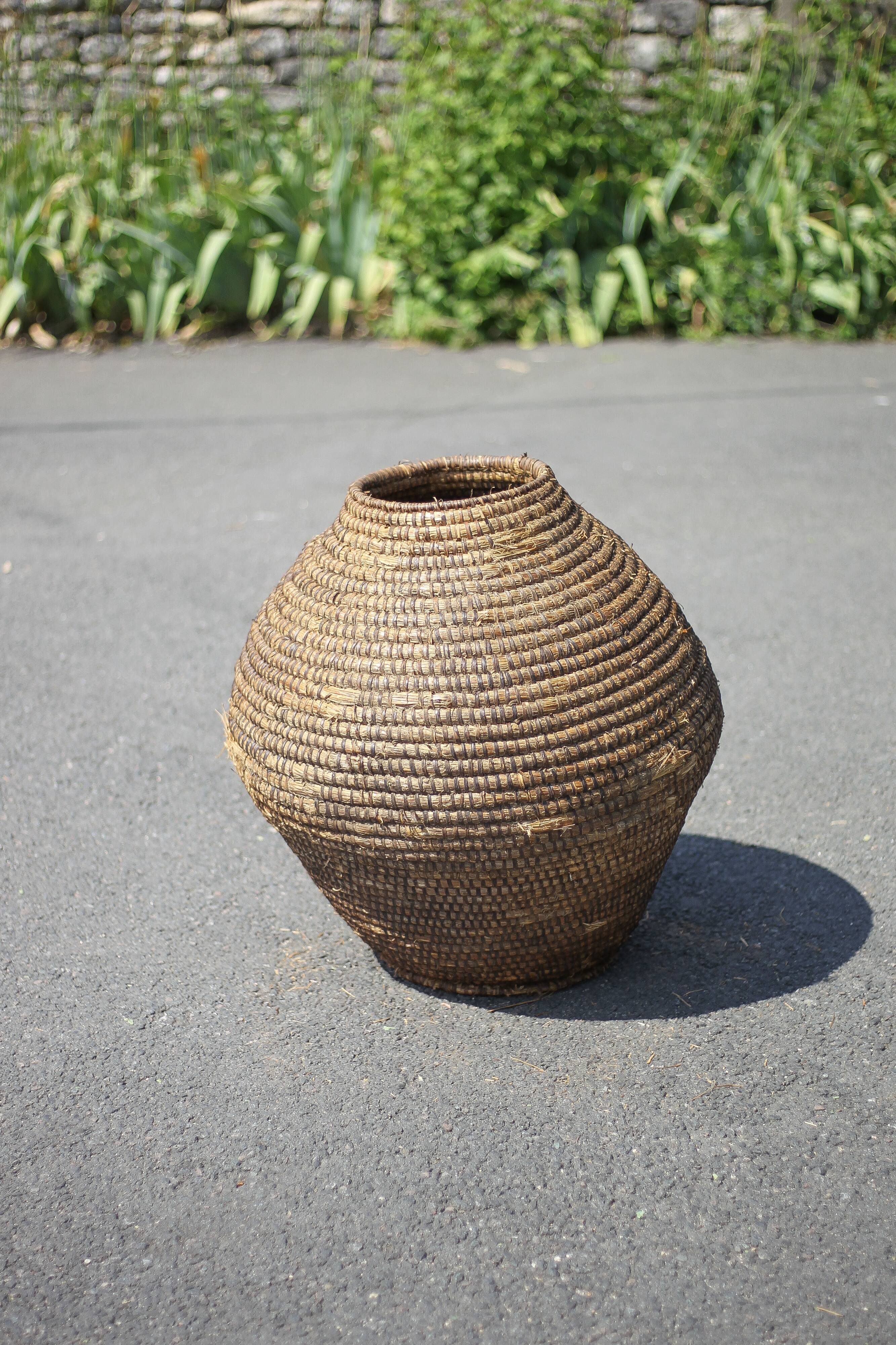 Large old basket, burgundy straw and bramble, woven basket