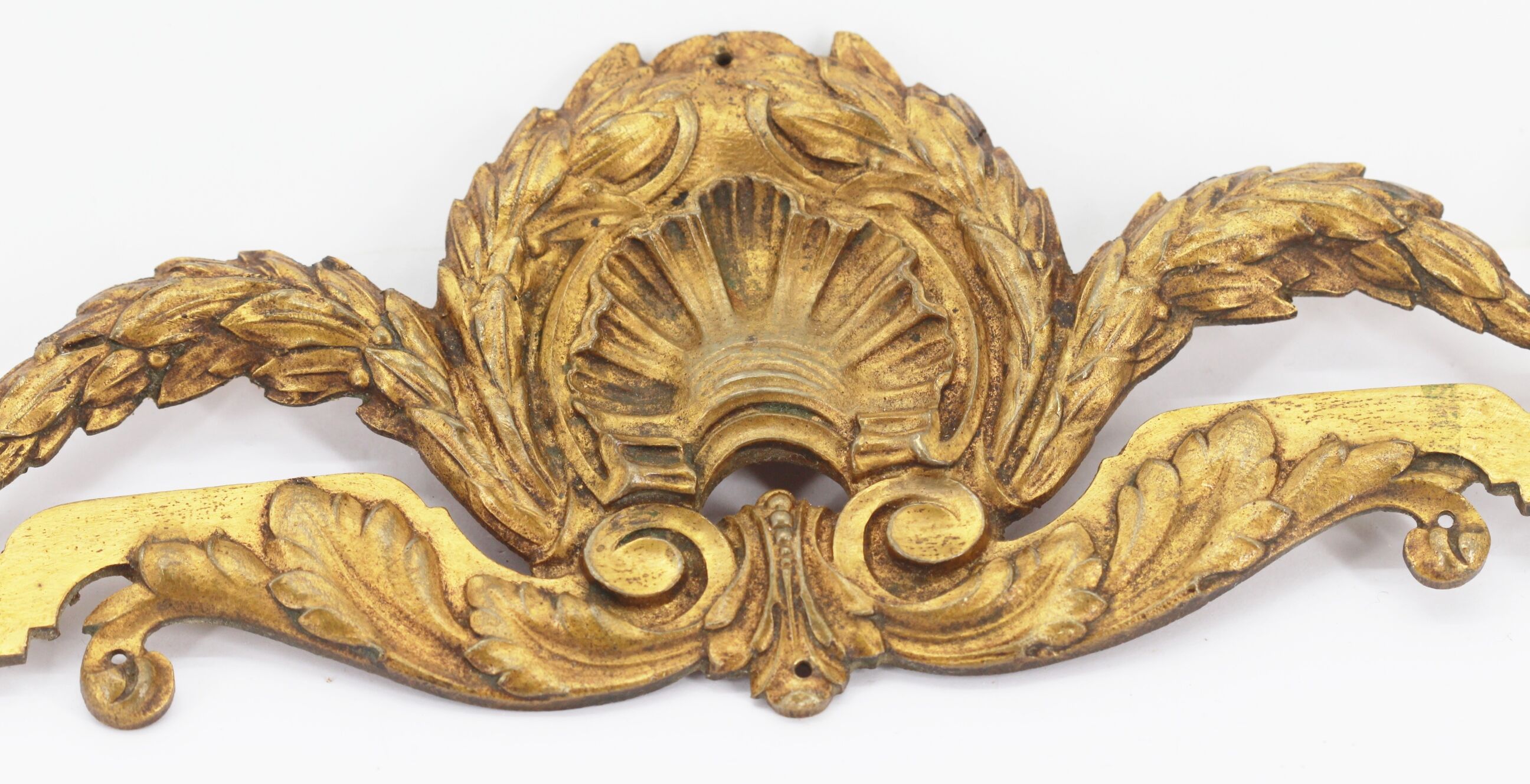 Old brass pediment