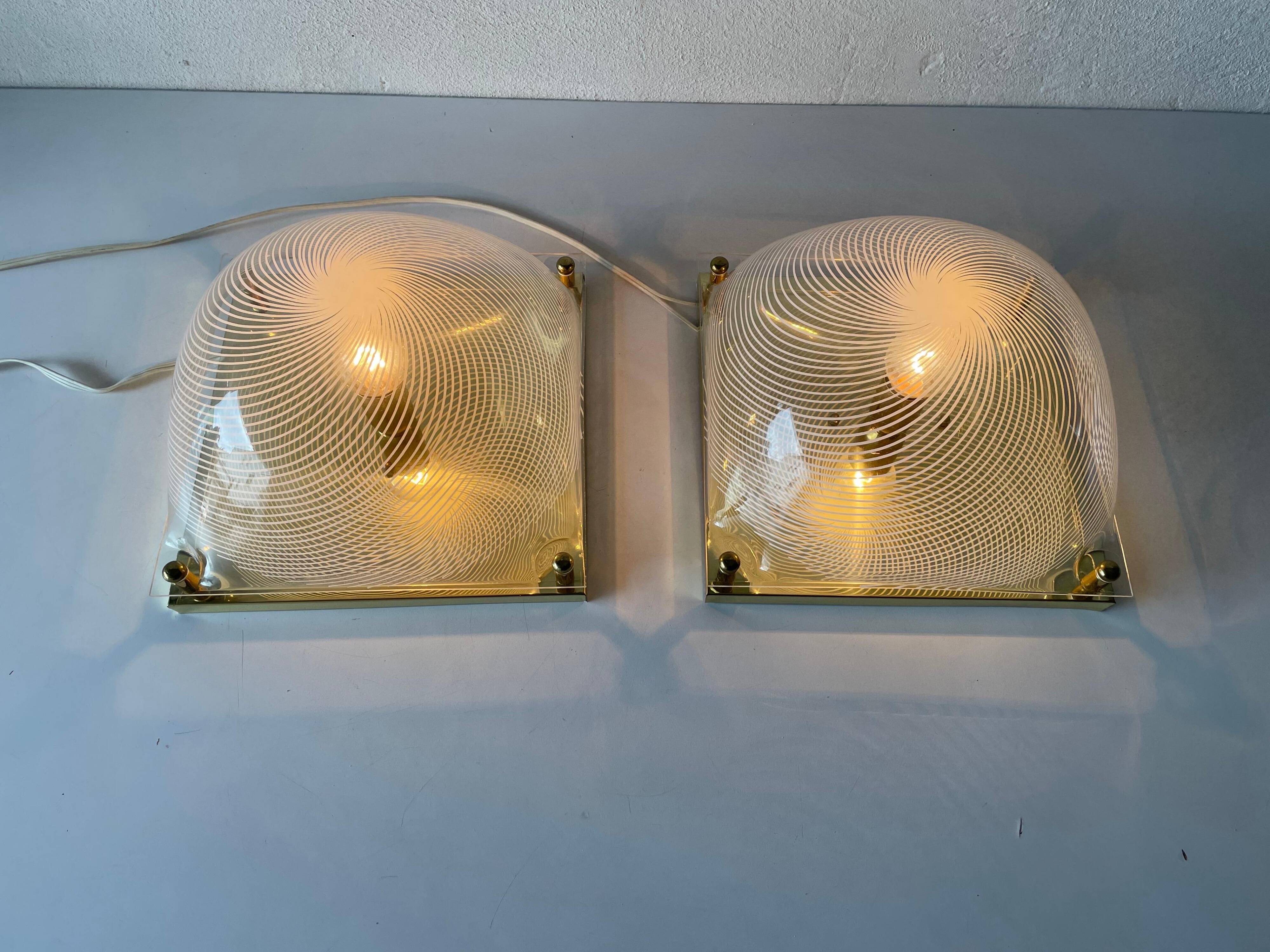 Pair of wall lights or flush mounts in plexiglass by Leola, 1970s, Germany.