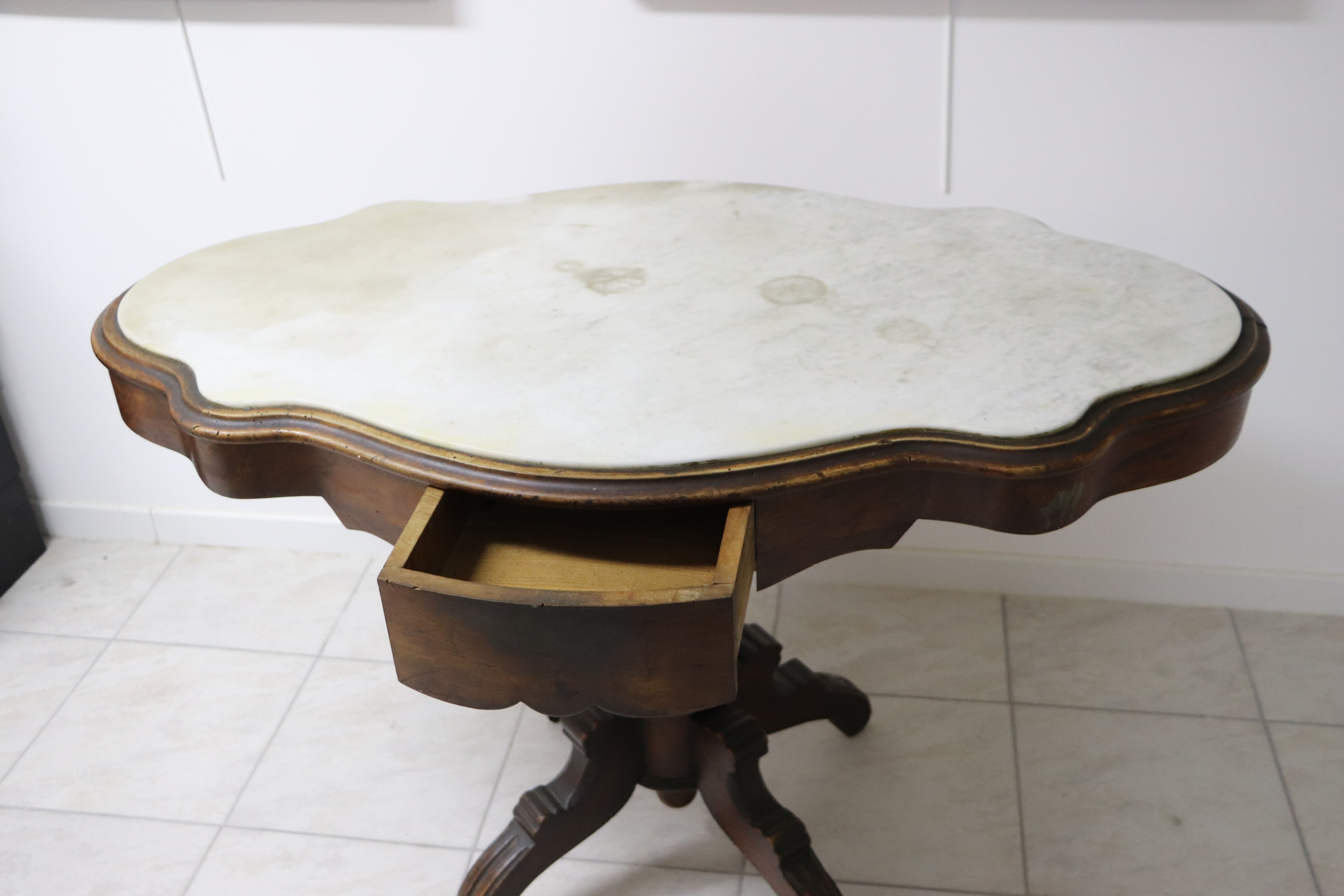 Art Deco wheeled table with 2 walnut drawers on white marble top