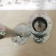 Pair of hammered metal candlesticks
