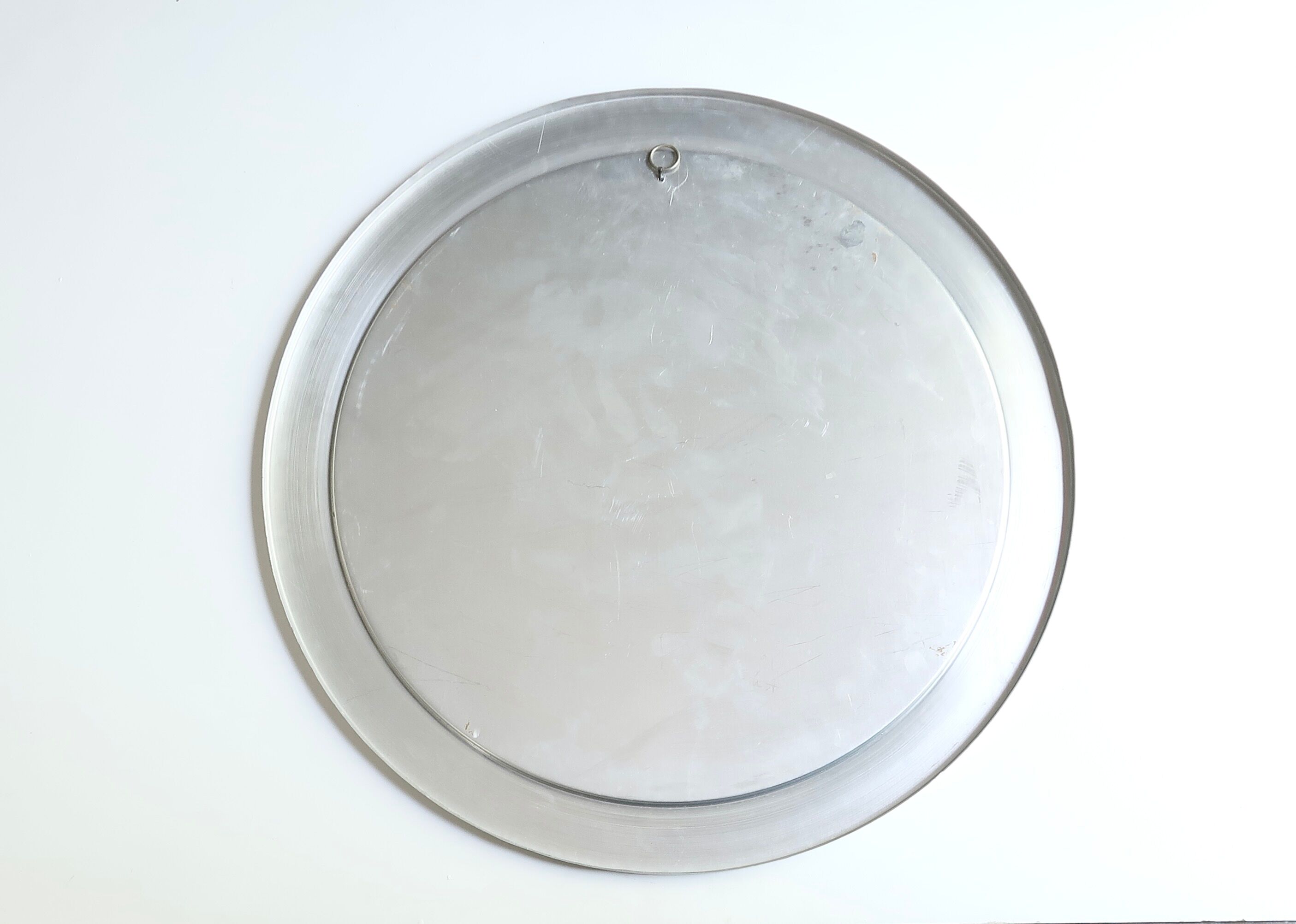 Round brushed aluminium mirror, 1970s