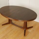 Extendable oval elm table with Baumann extensions