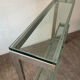 Console "G" by Belgochrom in brass and glass from the 1970s.