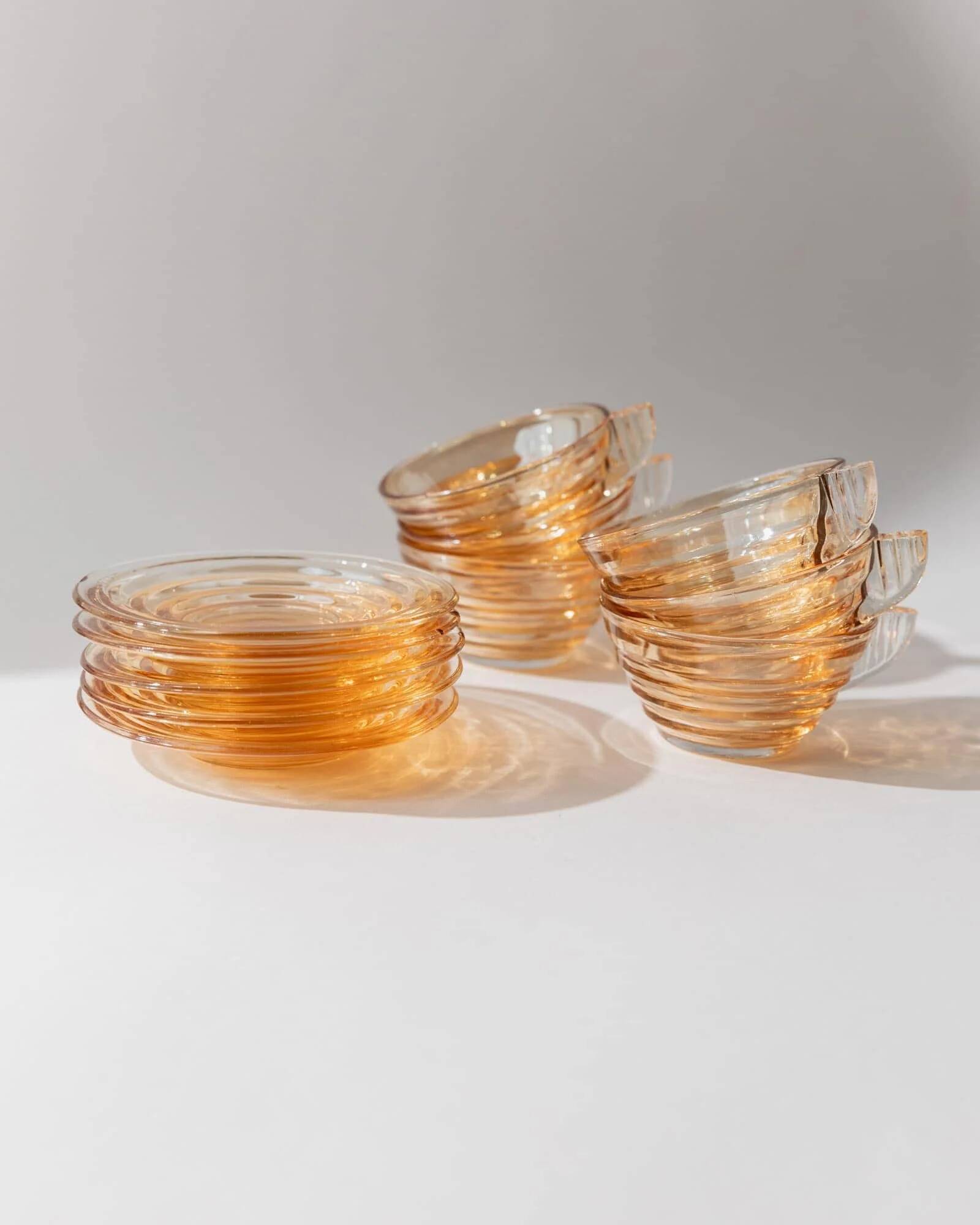 Vintage 1950s glass coffee cups, set of 5, iridescent peach ribbed glass with saucers, Italian design Gondolo.