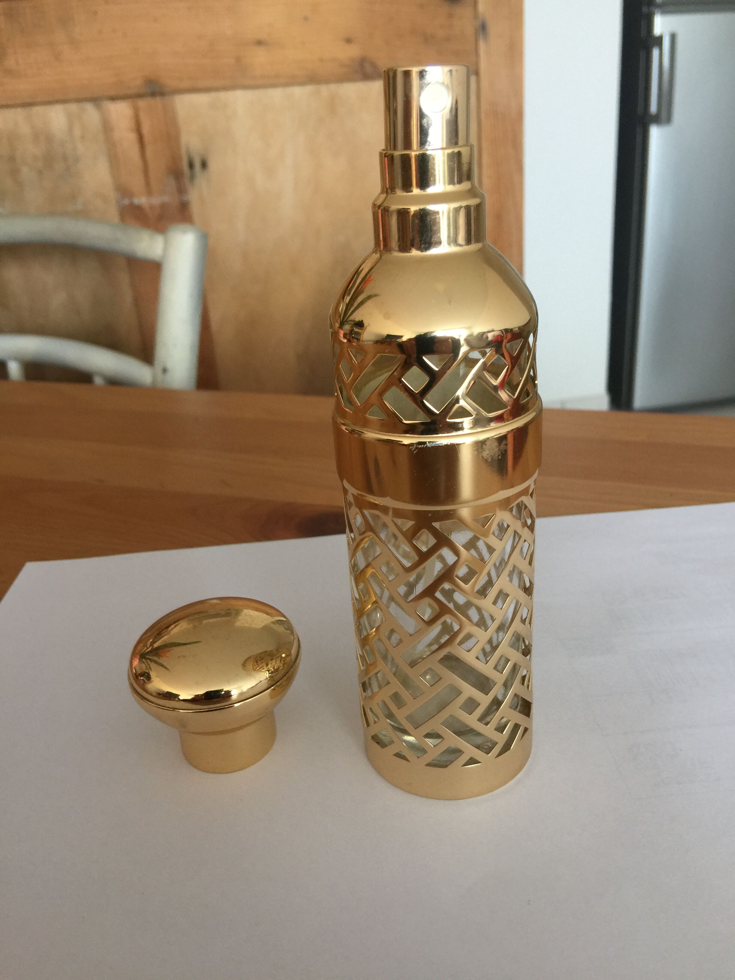 Perfume bottle Chant d'aromes by Guerlain gilded 1981