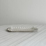 Metal butter dish and thick rectangular glass bowl.
