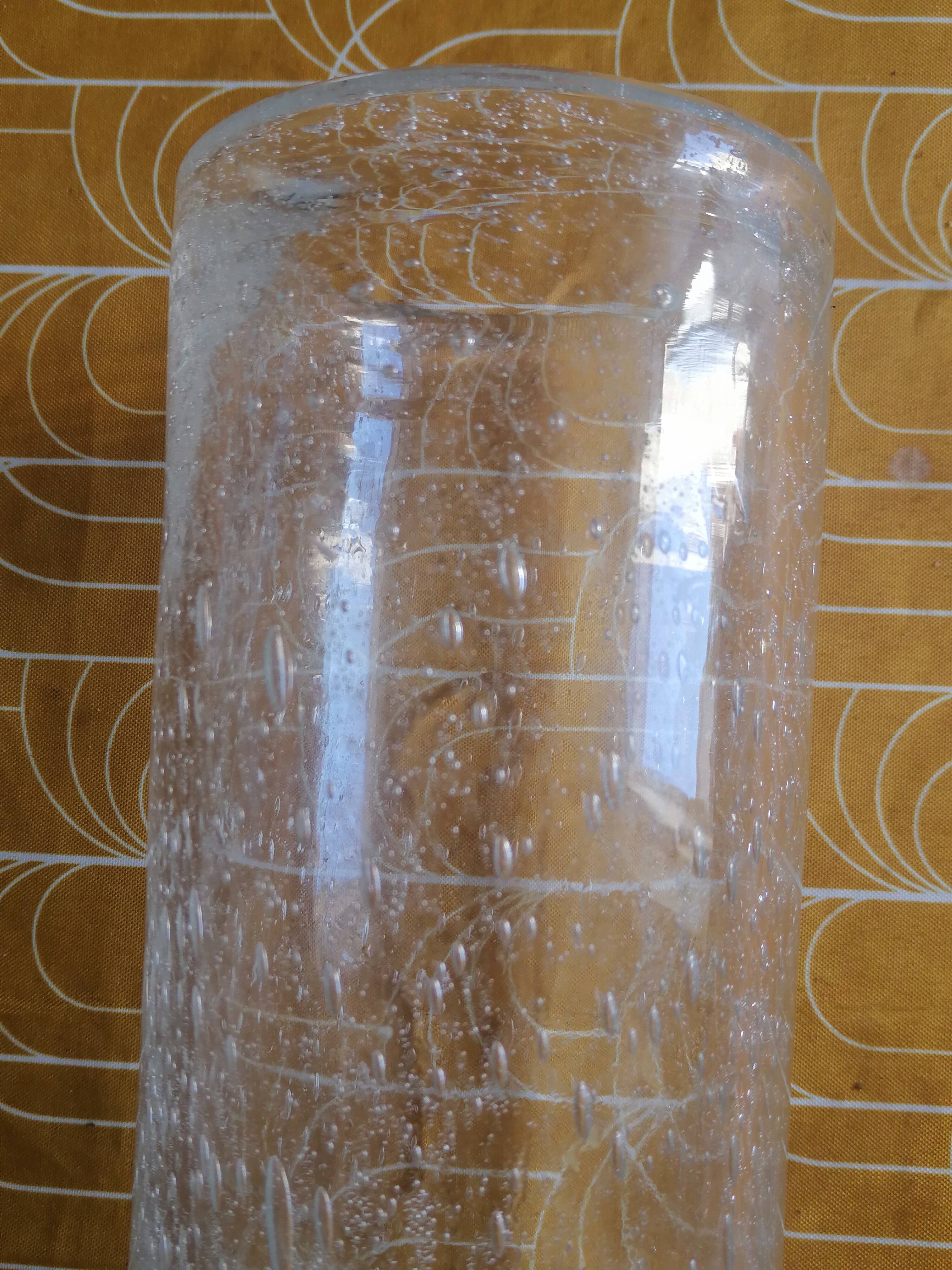 Old biot glass roller vase