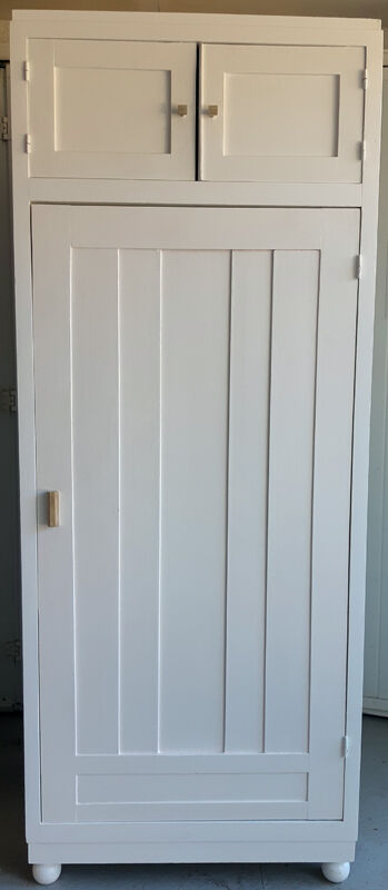 Vintage wardrobe in white wood