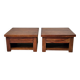Pair of handcrafted walnut bedside tables from the 20th century.
