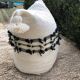 Pouf de sol en laine "a cheval"