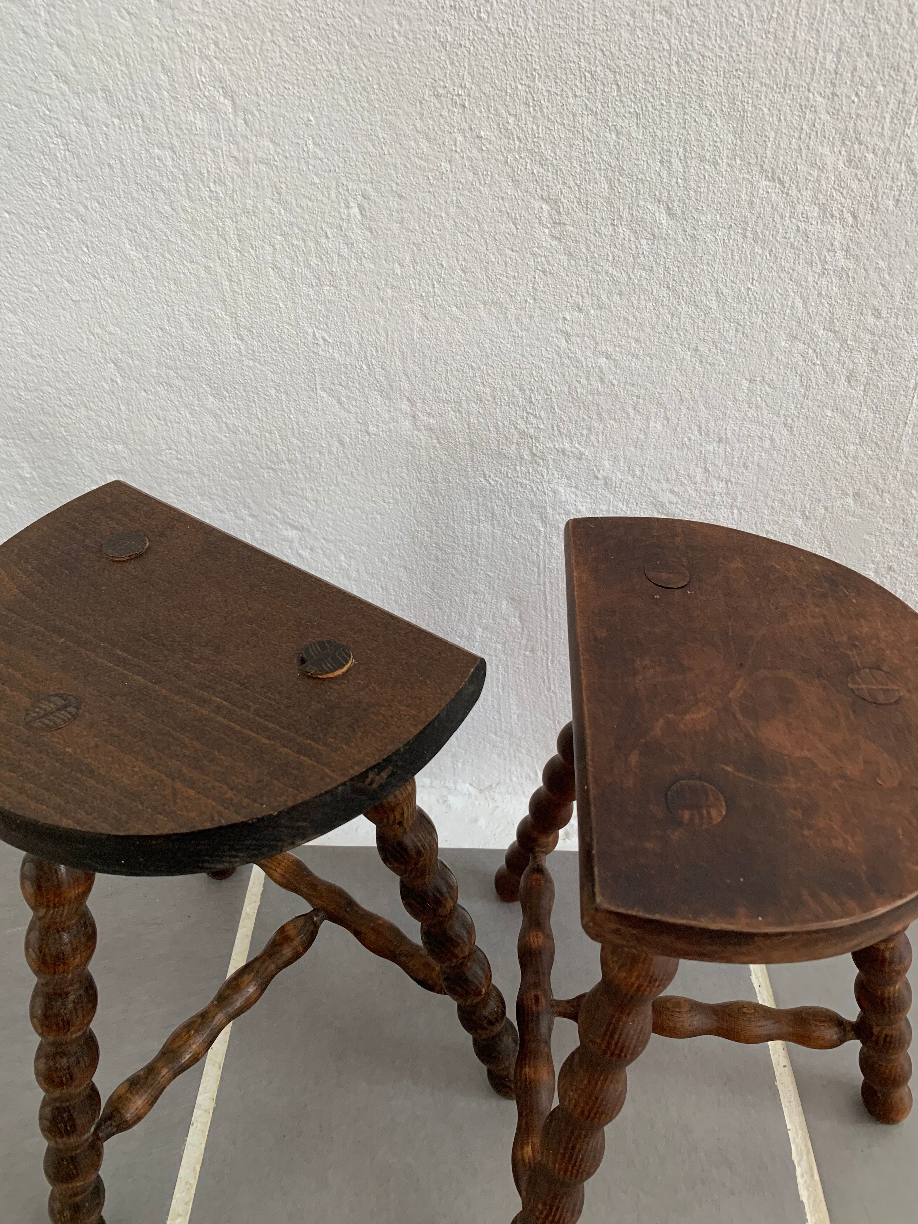 Pair of tripod stools turned wood