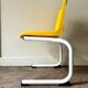 Children's chair in white metal and yellow plastic