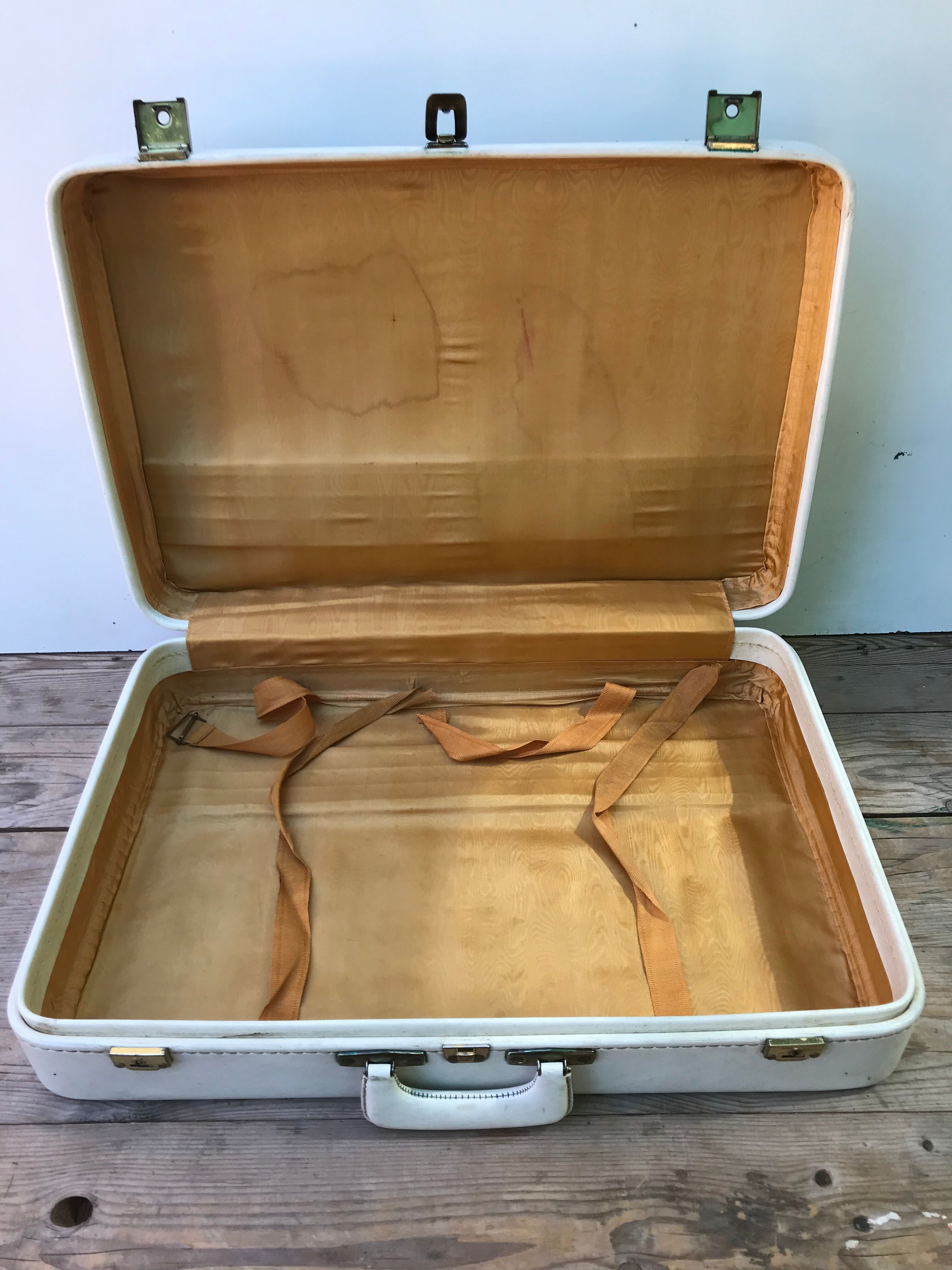 Old white leather case with vintage 70s leather handle