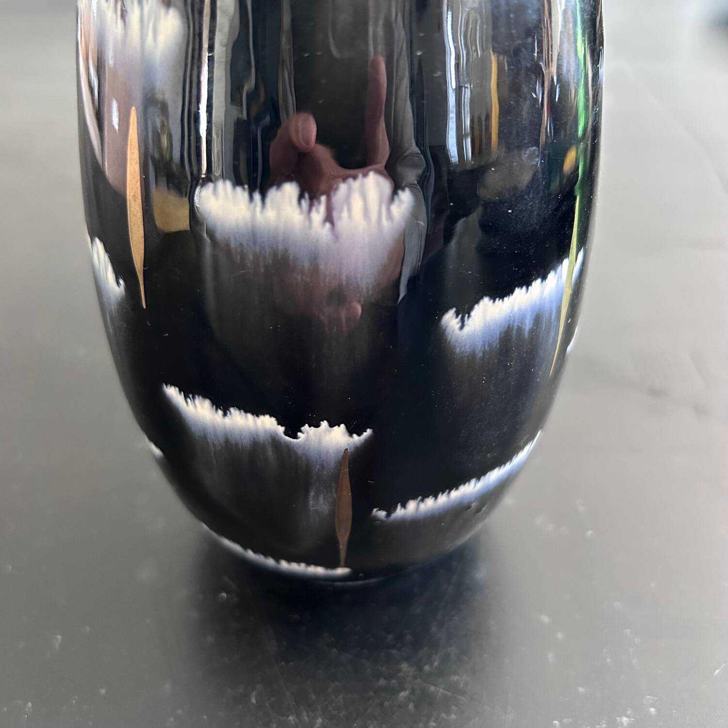 Black, white and gold art deco vase