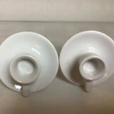 Pair of small white cellar rat candlesticks