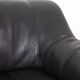 Maison De Sede. Armchair and its ottoman in black leather. 1970s.