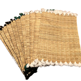 Braided placemats with pompoms