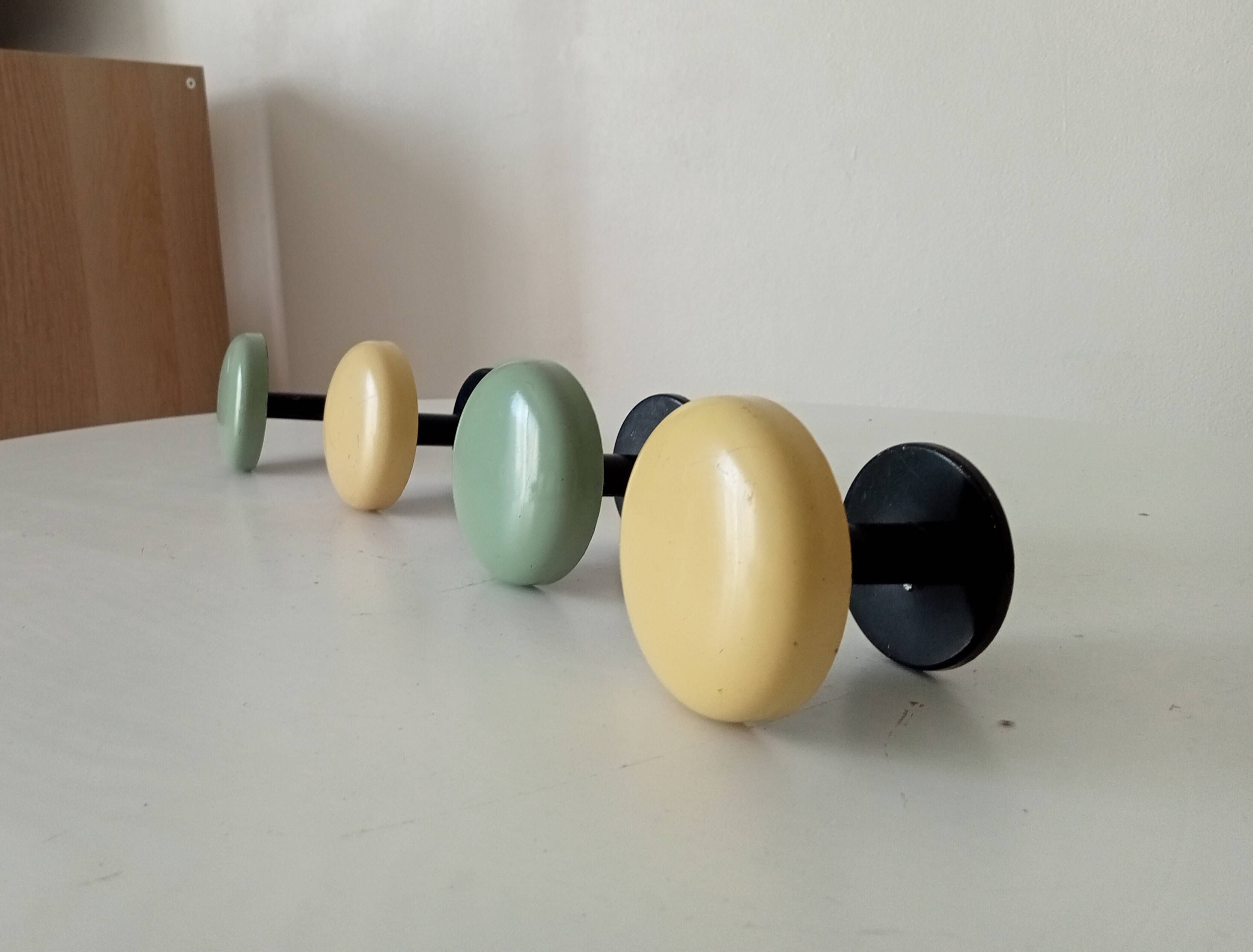 Set of 4 vintage coat hooks from the 1960s.