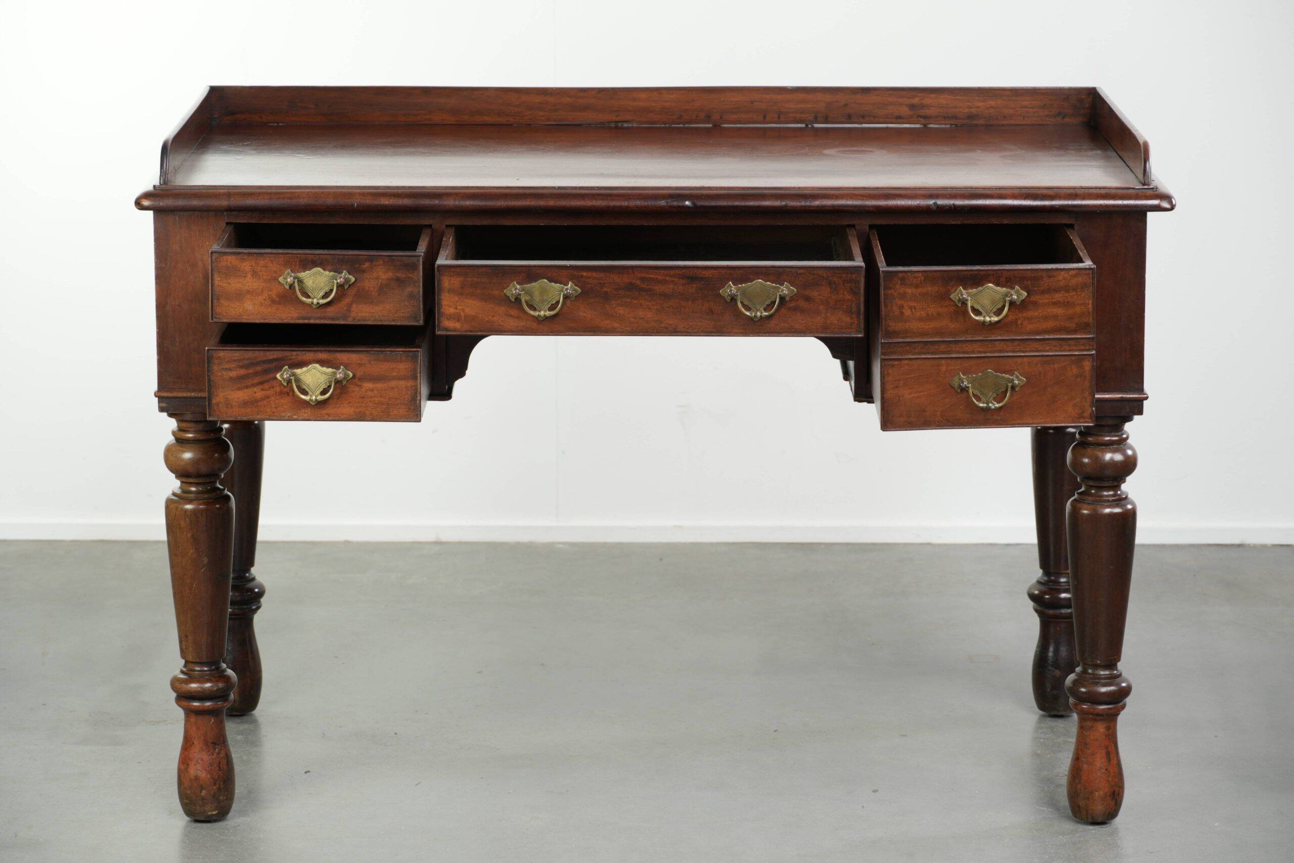Elegant antique English desk / writing table from the mid-19th century