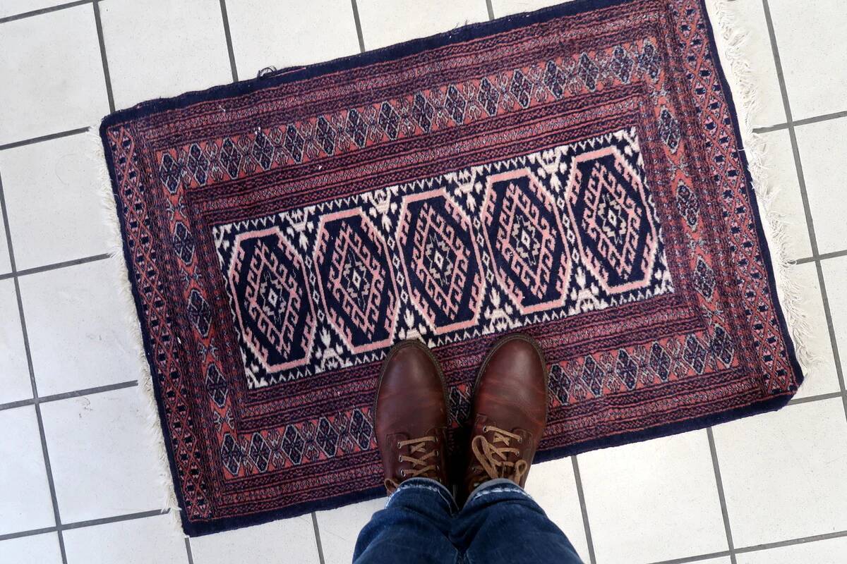 Handmade vintage 1960s Uzbek Bukhara rug – small wool tribal carpet (65cm x 95cm)