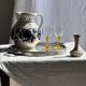Very large vintage ceramic carafe in white glazed with blue floral decoration.