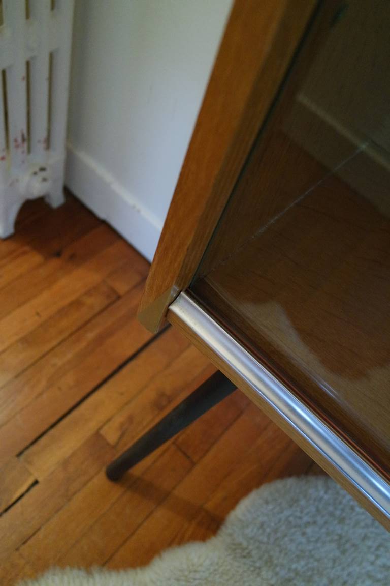 Small window on high metal feet