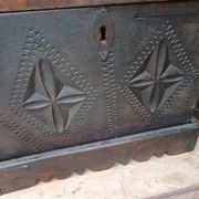 Small French chest from the 17th century in its own juice.