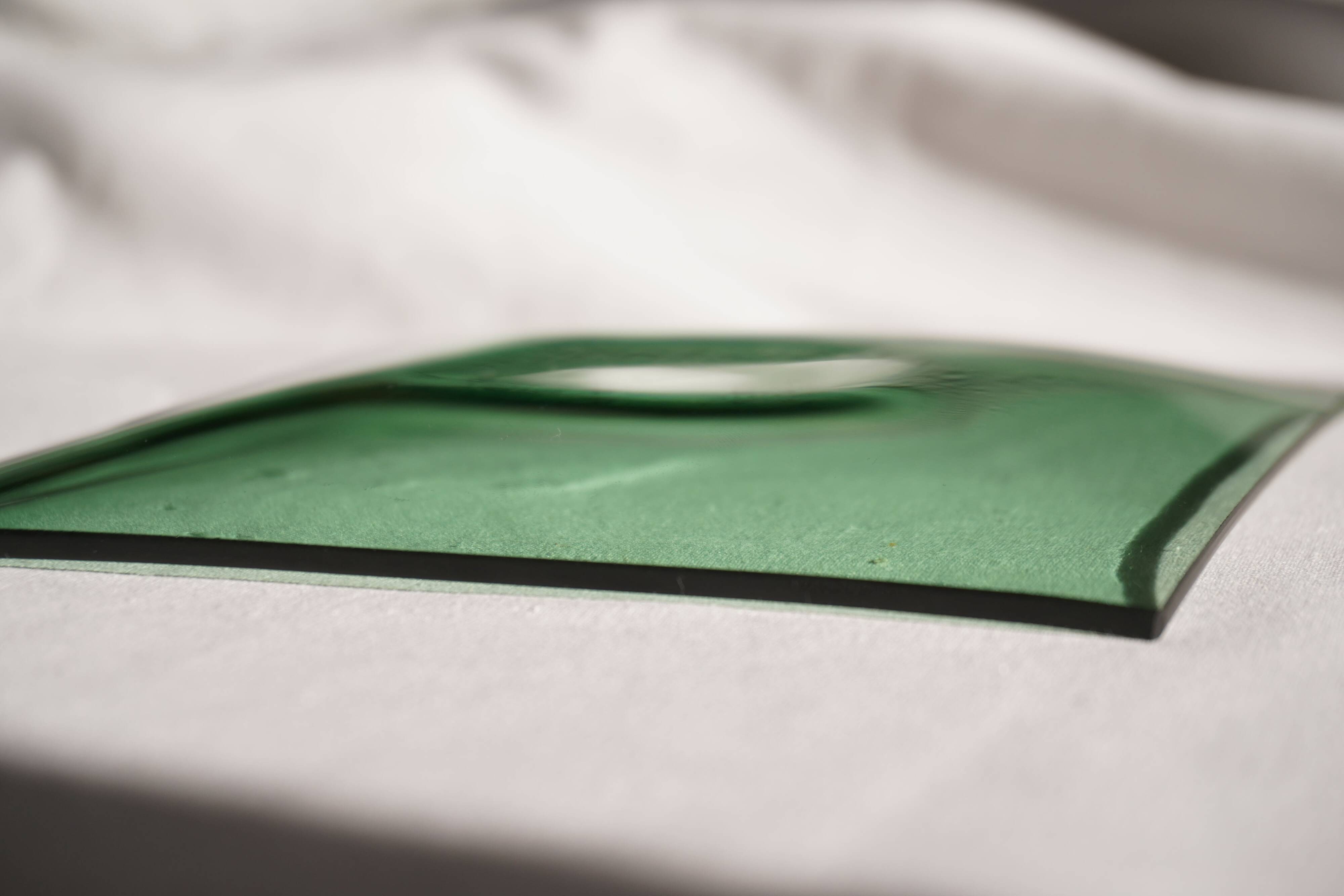 Set of 4 small square green glass plates/bowls