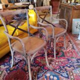 Angled wooden armchairs