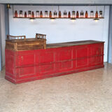 Former red patina and oak tray trading counter