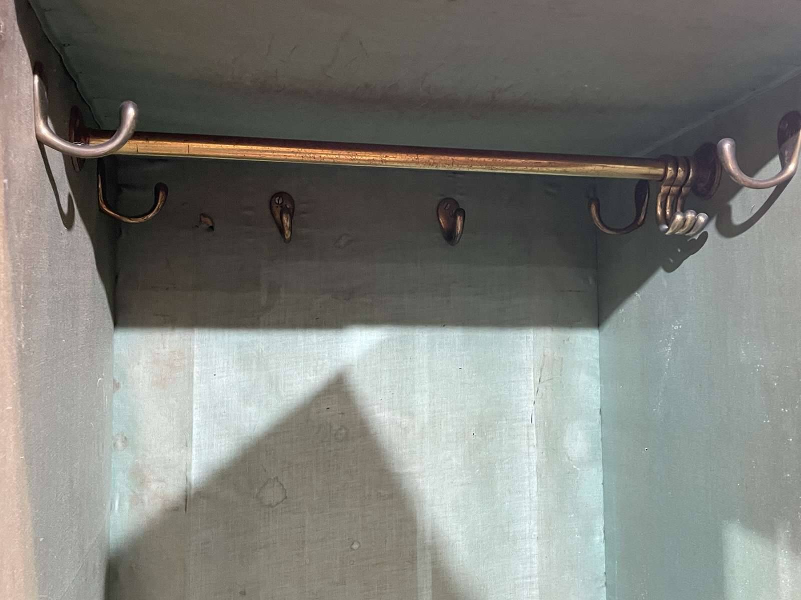 19th-century English mahogany three-door wardrobe.