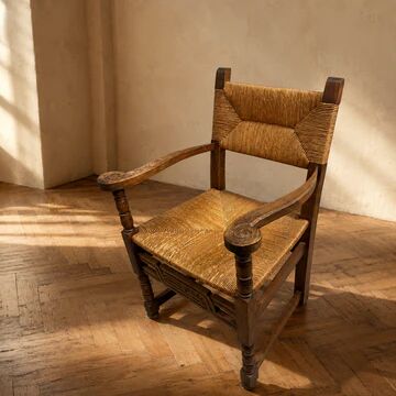 Rustic armchair made of woven rush, 1960s–1970s.
