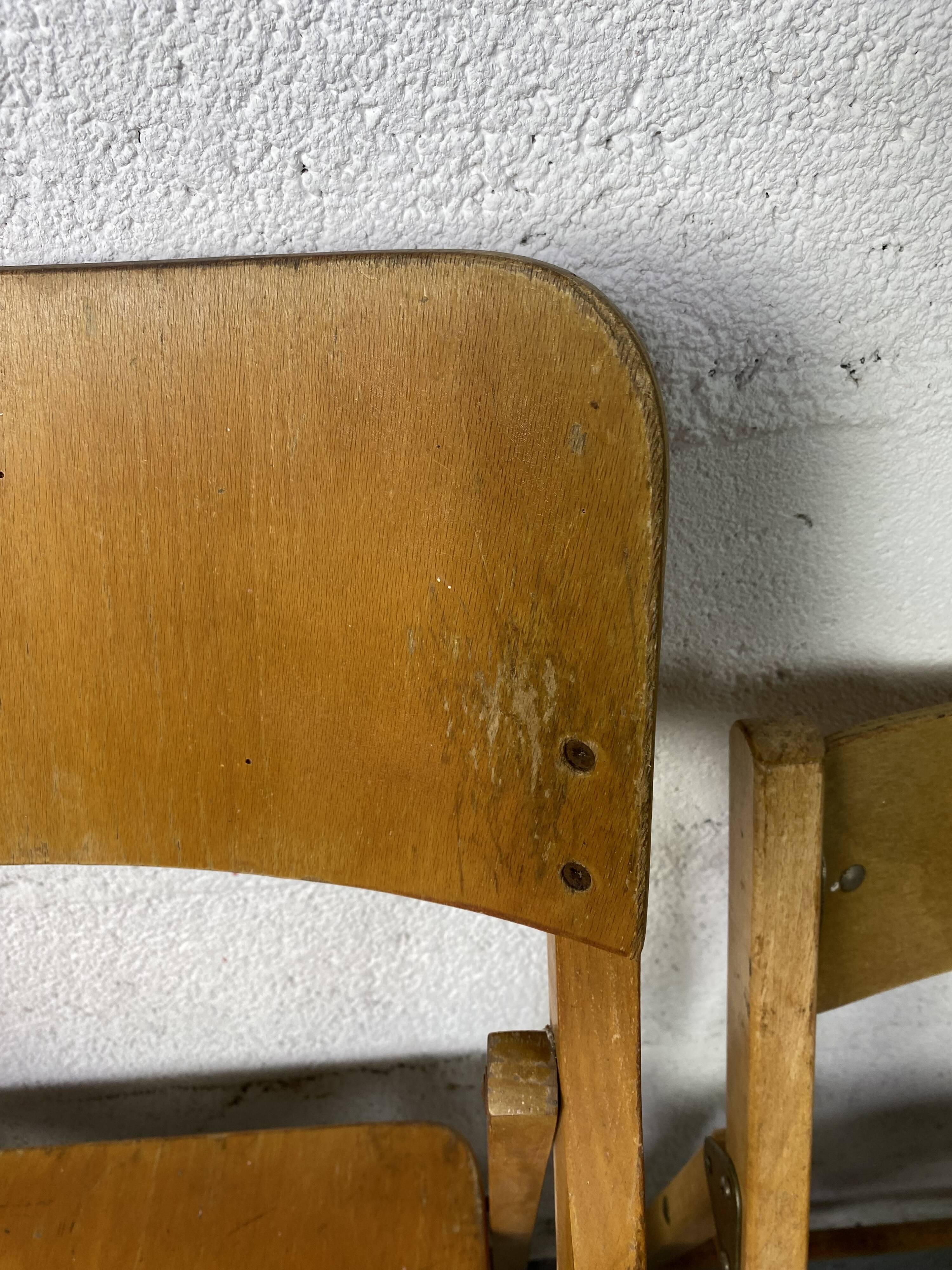Pair of mismatched wooden folding chairs
