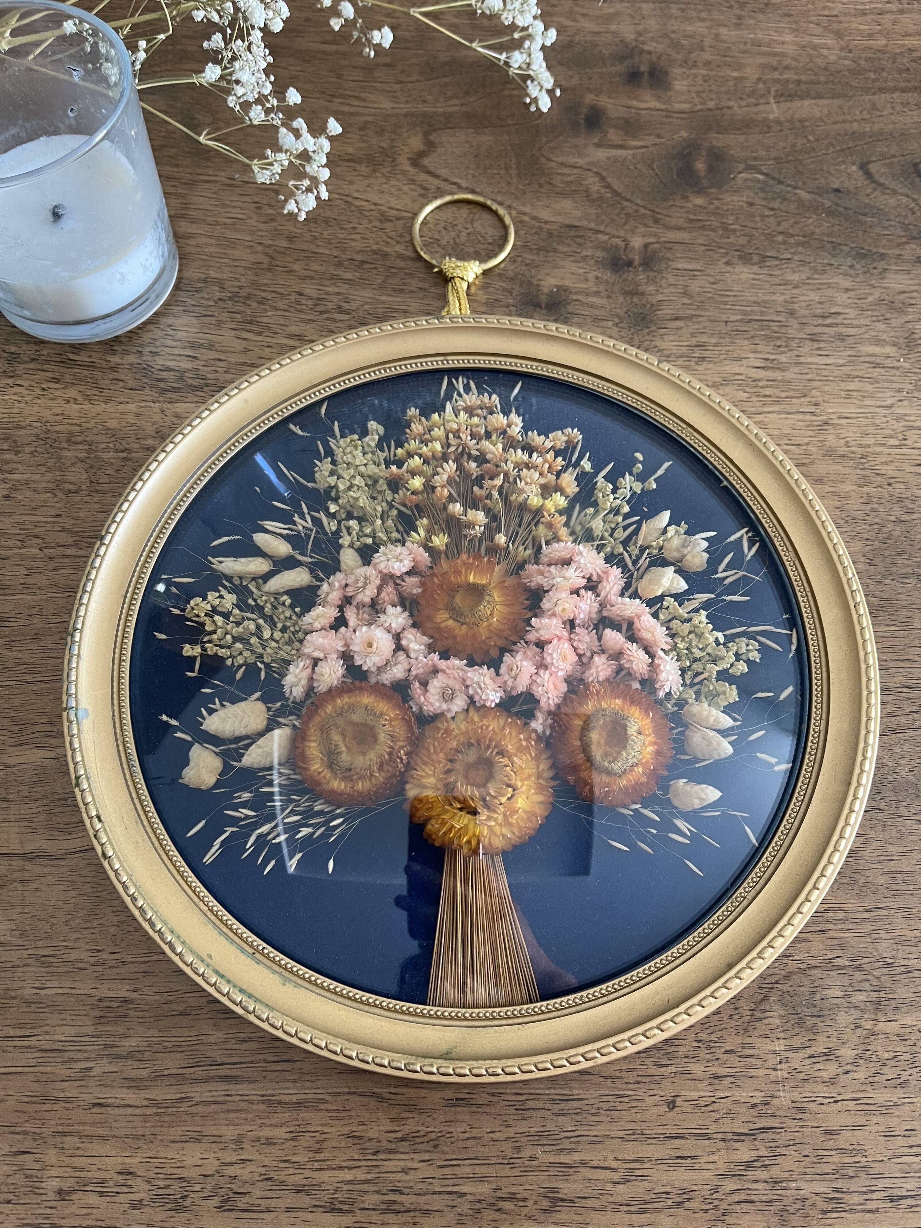 Cadre rond verre bombé fleurs séchées