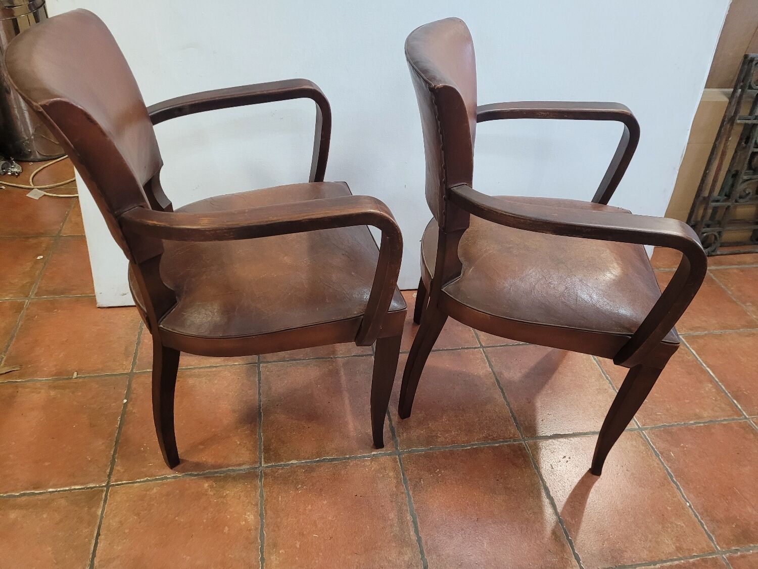 Pair of antique leather bridge armchairs