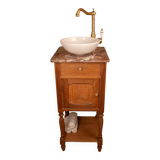 Washbasin made from a bedside table.