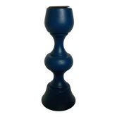 Blue wooden candle holder in Scandinavian style.
