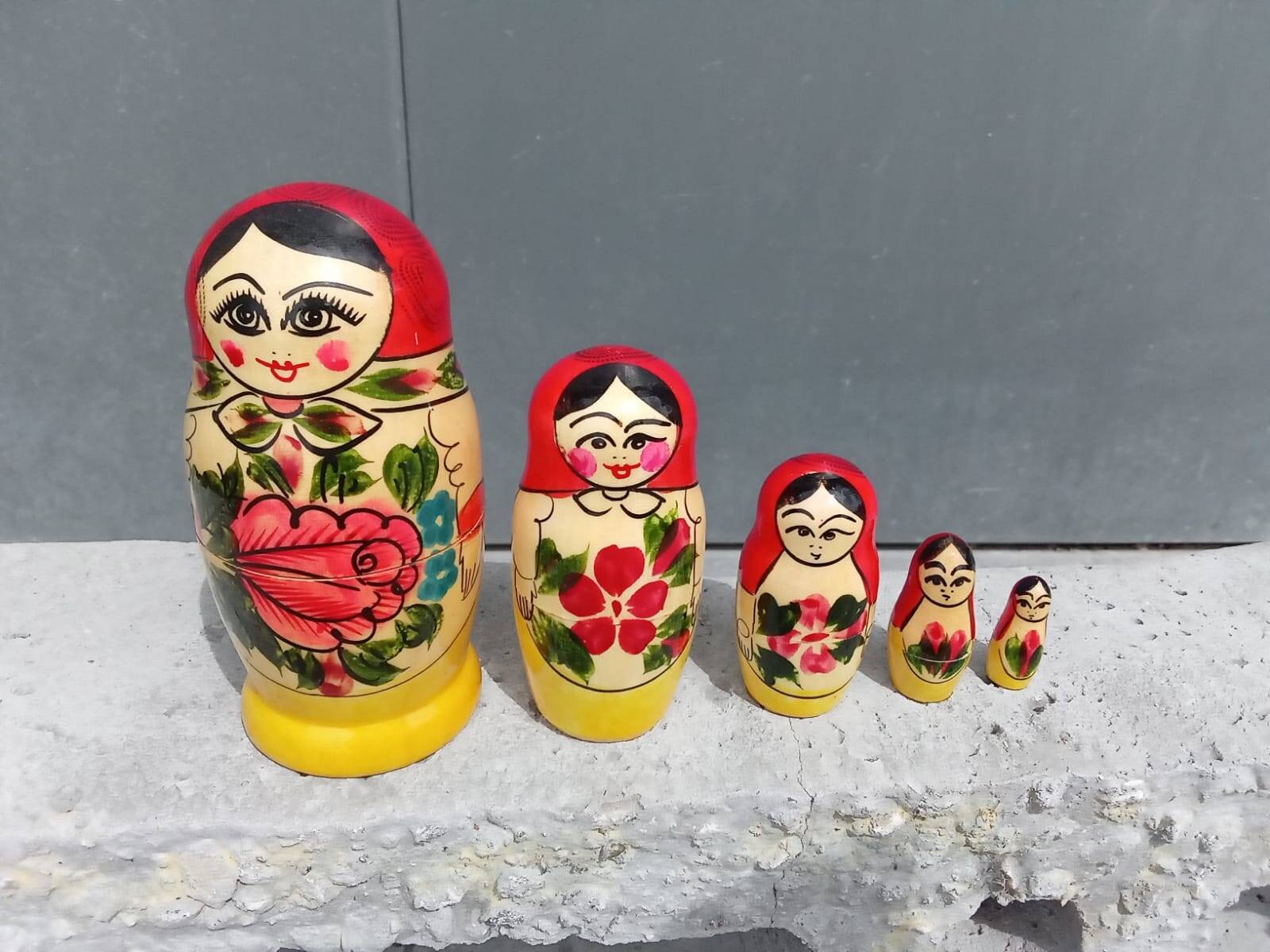 Decorative Russian Matryoshka dolls made of hand-painted wood.