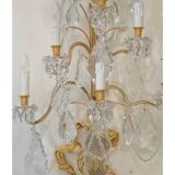 Pair of wall lamps, 1930-1940, in gilded bronze and crystal grapevines