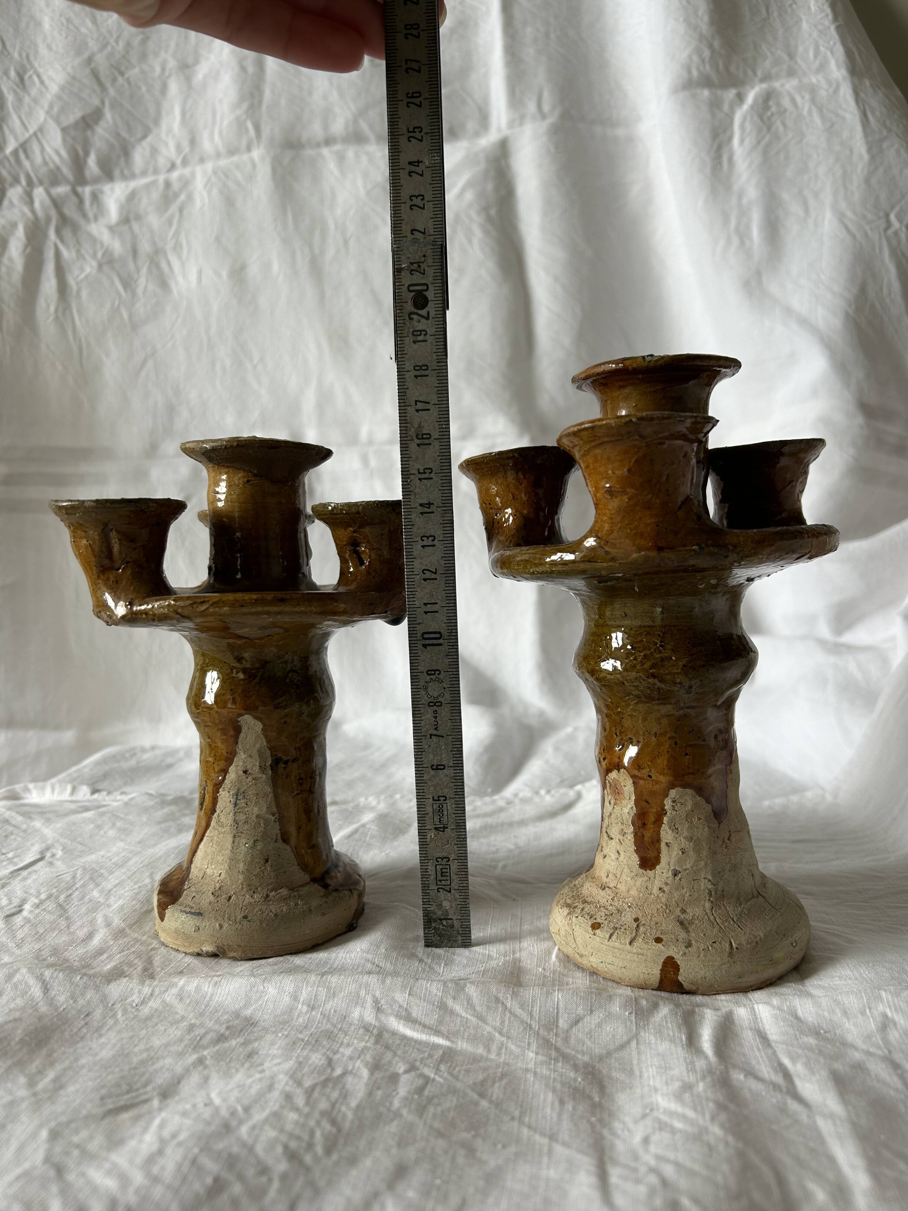 Set of two antique candlesticks