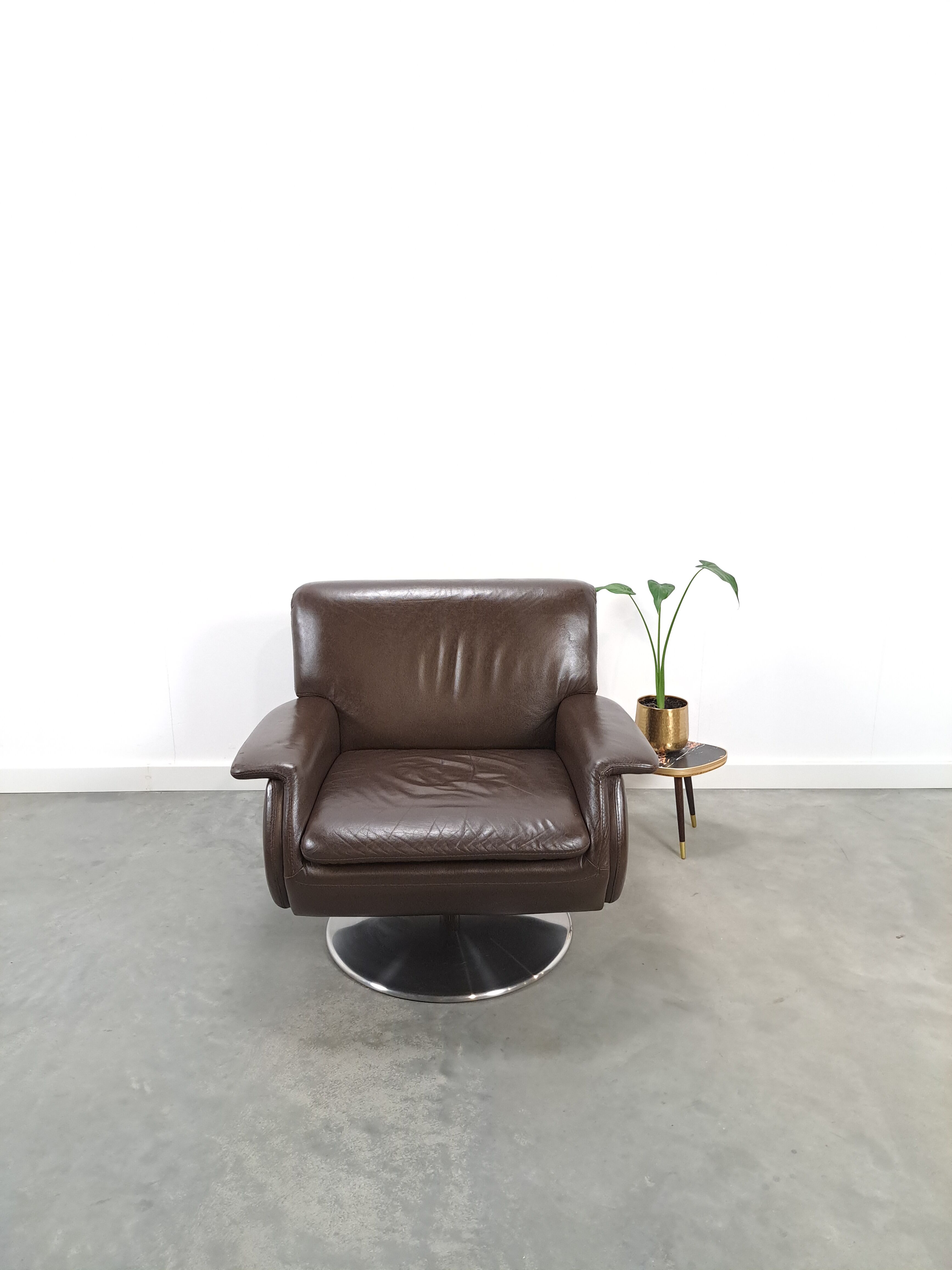 Brown leather swivel chair